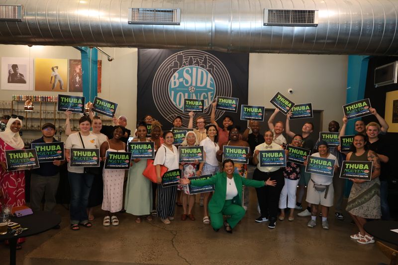 Group photo of excited volunteers at the campaign kickoff event